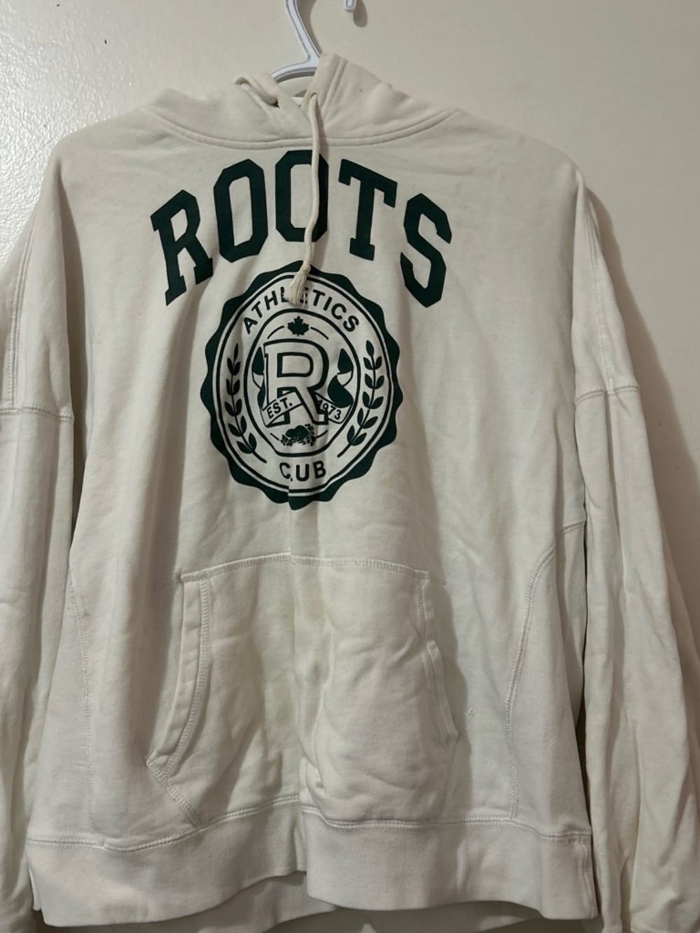Roots Women’s Cream Pullover Hoodie with Dark Green Crest